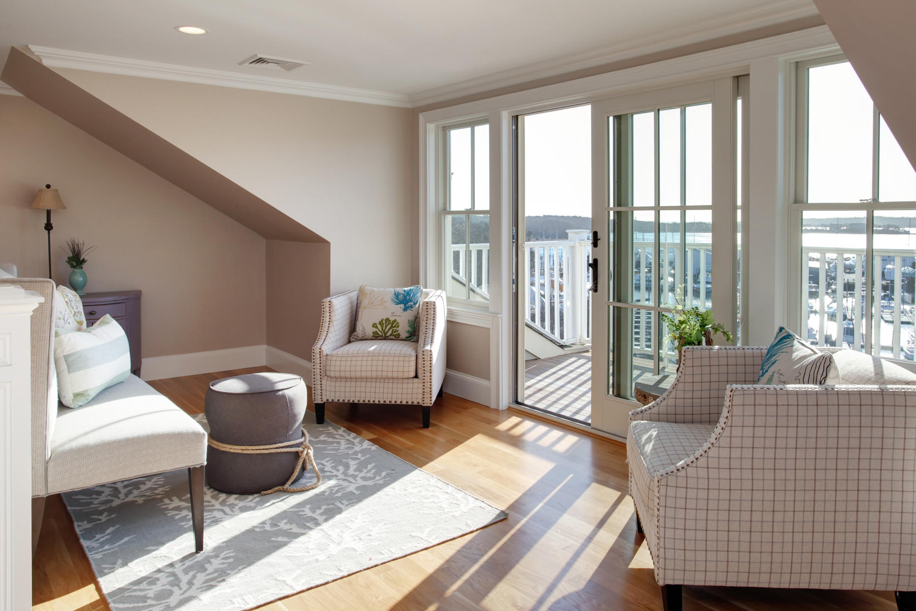 1090 Shore Road, Unit 8 Pocasset, MA 02559 - Photo 18 of 32 a living room with furniture and a floor to ceiling window