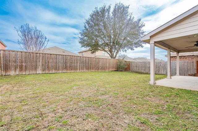 a view of a backyard with a garden