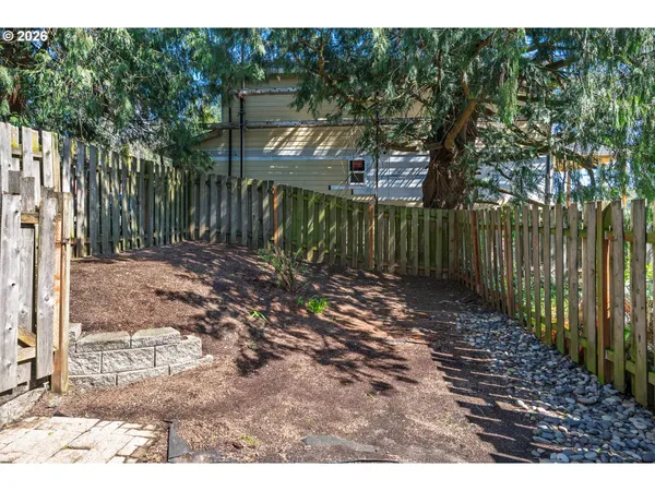a backyard of a house with lots of green space
