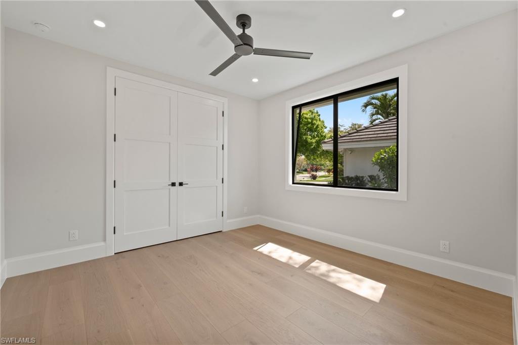 207 Monterey Drive Naples, FL 34119 - Photo 25 of 47 a view of an empty room with a window