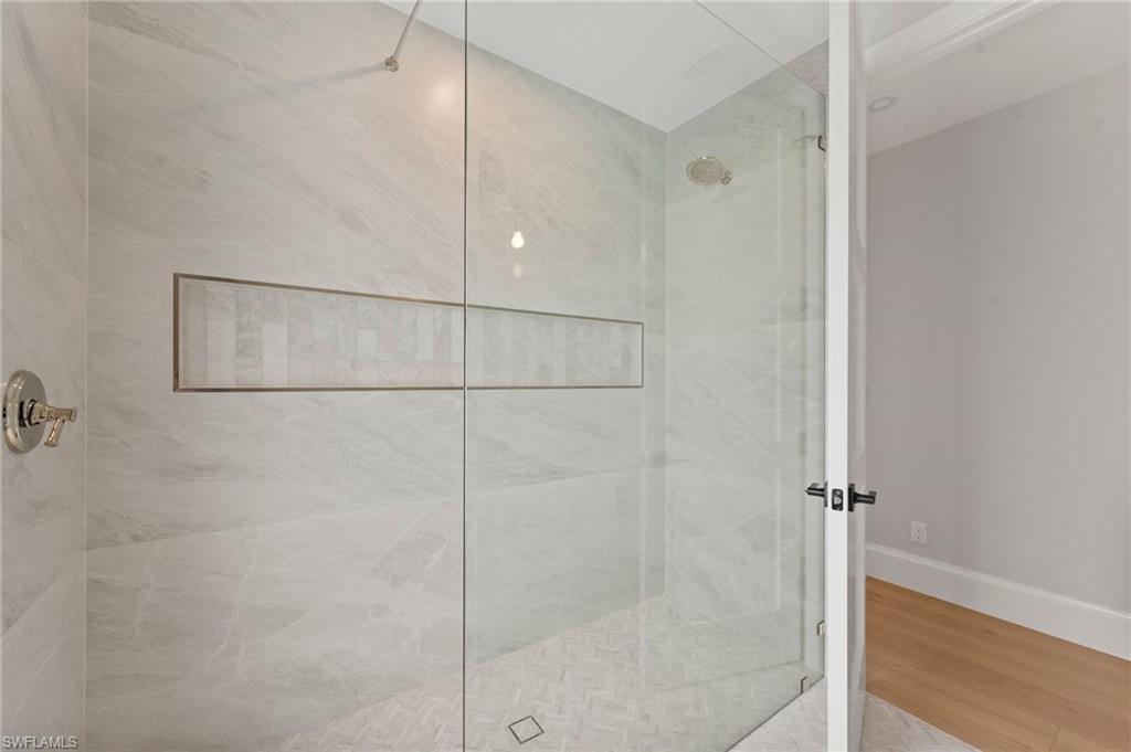 207 Monterey Drive Naples, FL 34119 - Photo 27 of 47 a bathroom with a shower