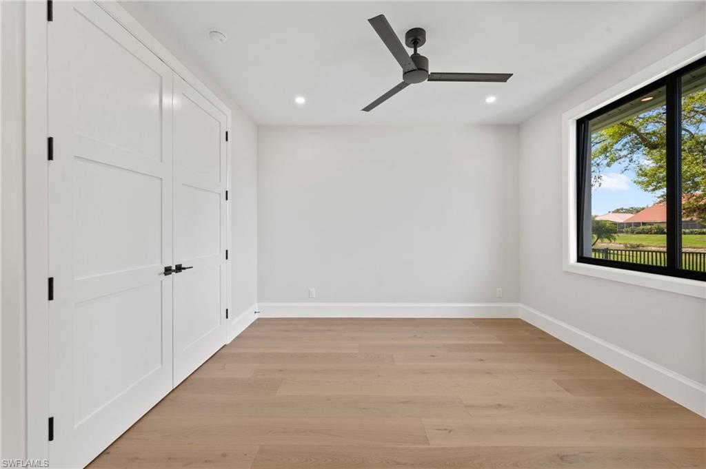 207 Monterey Drive Naples, FL 34119 - Photo 29 of 47 a view of an empty room with a window
