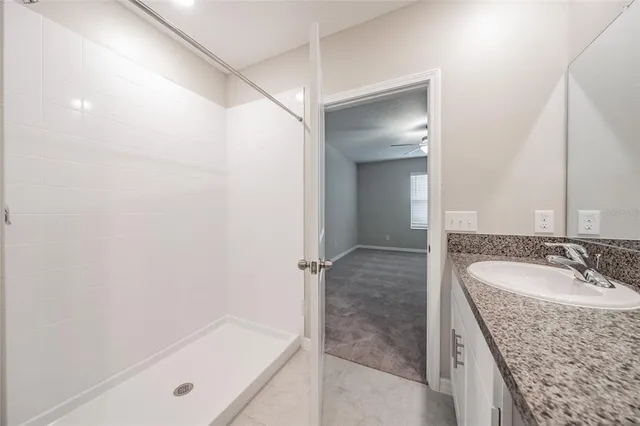 a kitchen with stainless steel appliances granite countertop a stove top oven a sink and dishwasher