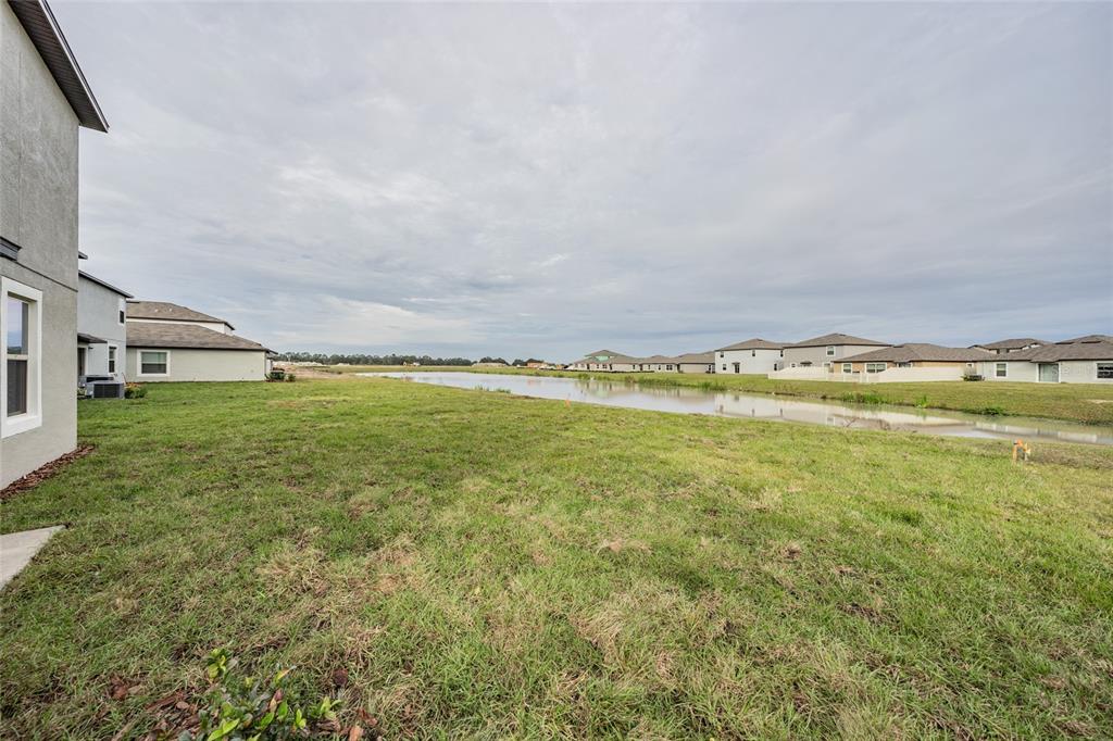 31807 Barrel Wave Way Wesley Chapel, FL 33545 - Photo 42 of 61 a view of an ocean with beach