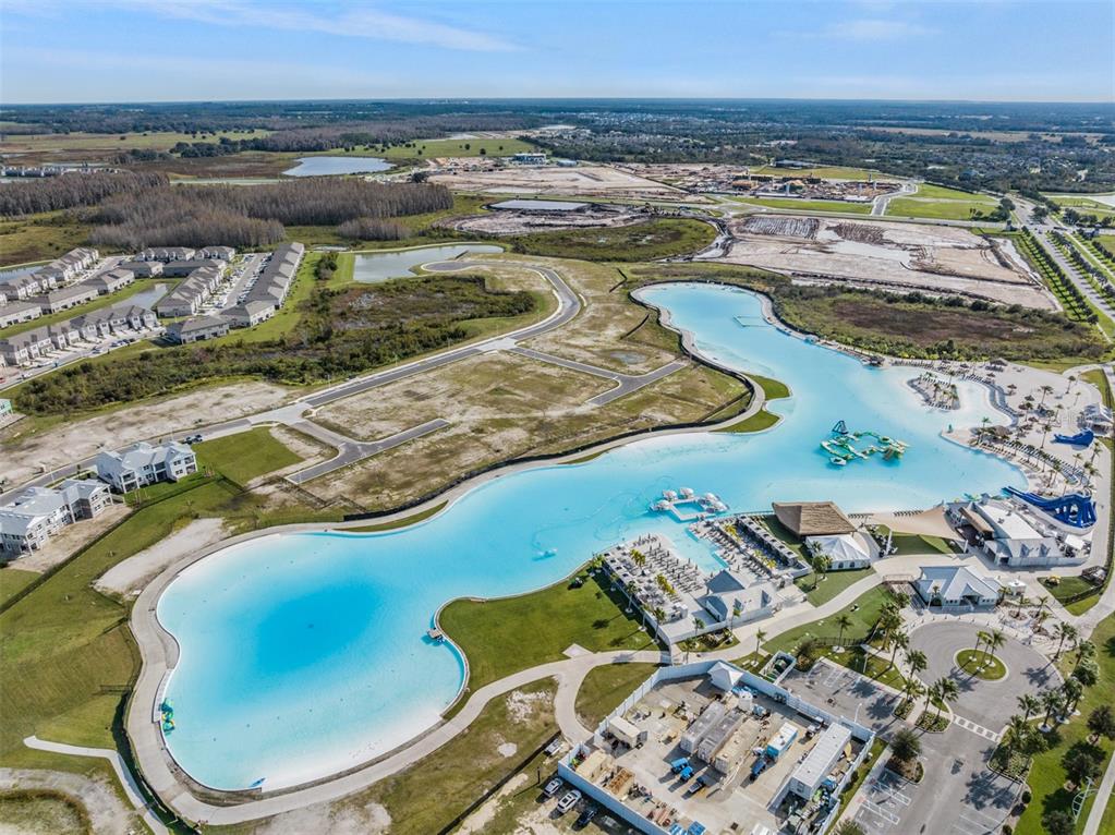 31807 Barrel Wave Way Wesley Chapel, FL 33545 - Photo 47 of 61 an aerial view of residential houses with outdoor space