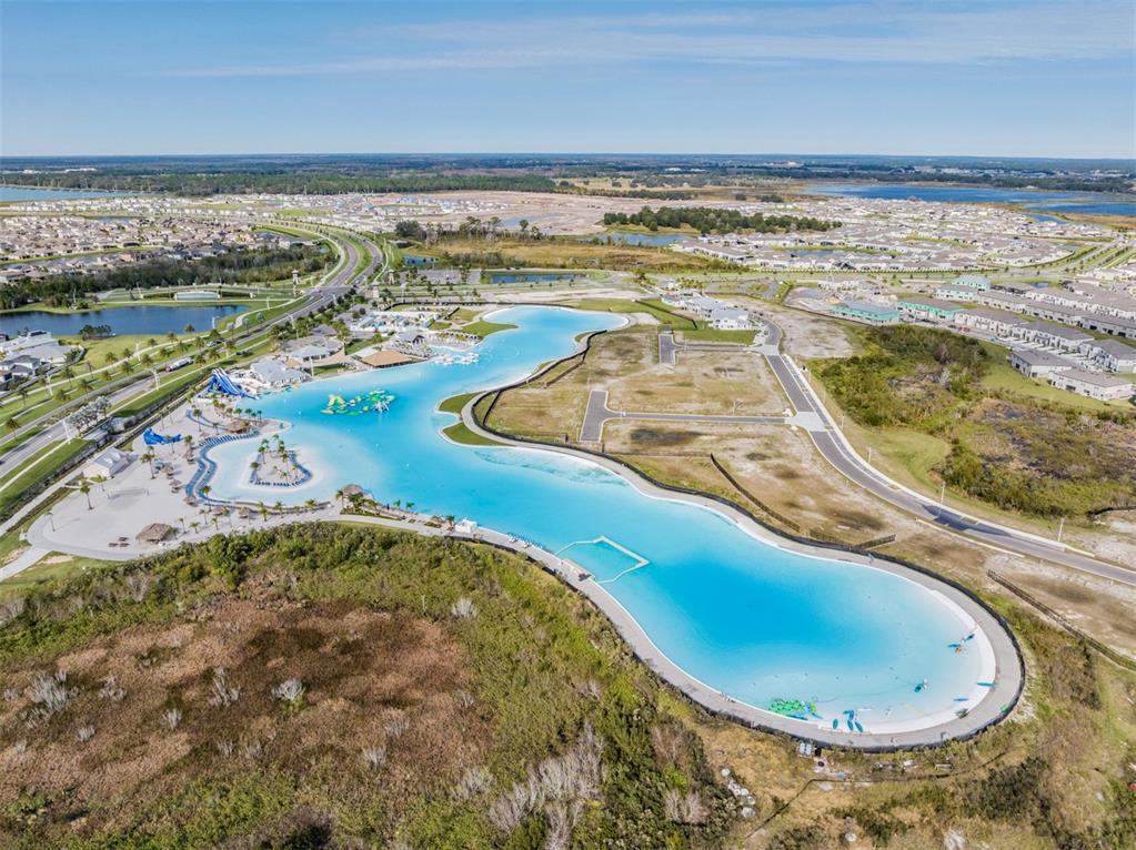 31807 Barrel Wave Way Wesley Chapel, FL 33545 - Photo 56 of 61 a view of a swimming pool and an ocean