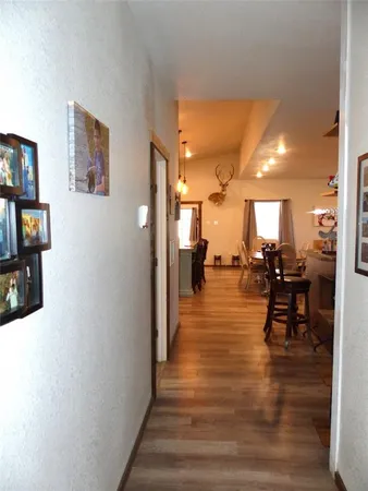 a view of a living room and dining room