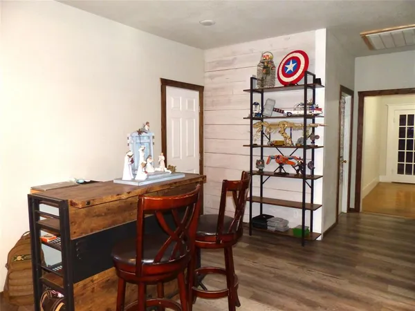 a view of a table and chairs in a room