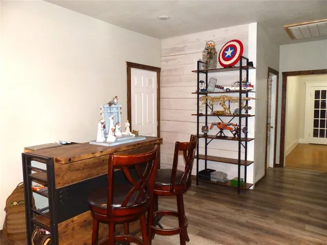 a view of a table and chairs in a room