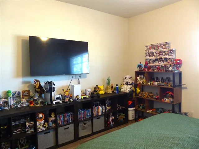 a room with lots of different colored cloths