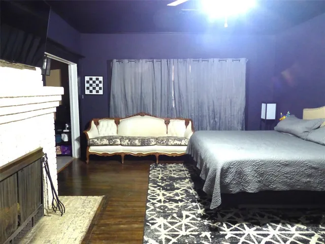 a bed room with a bed and a table