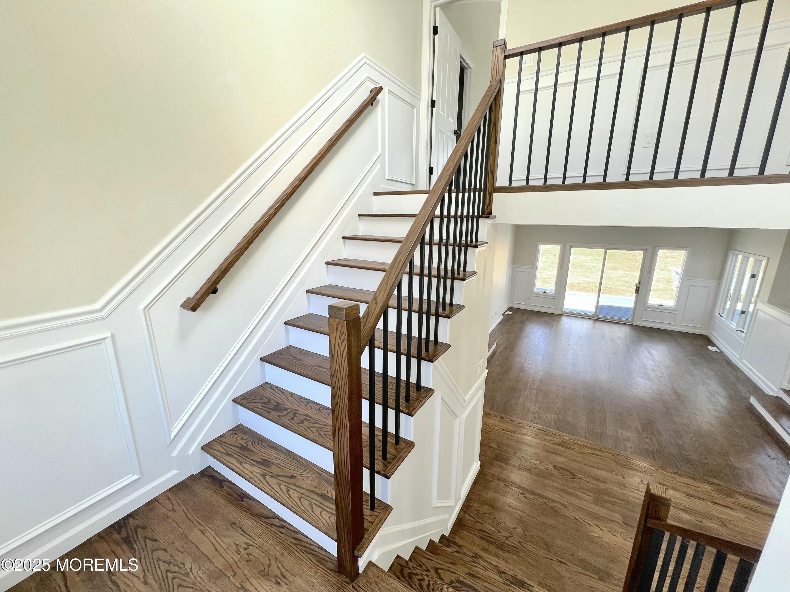 155 Hamilton Road Tinton Falls, NJ 07724 - Photo 13 of 49 a view of staircase with white walls and a window
