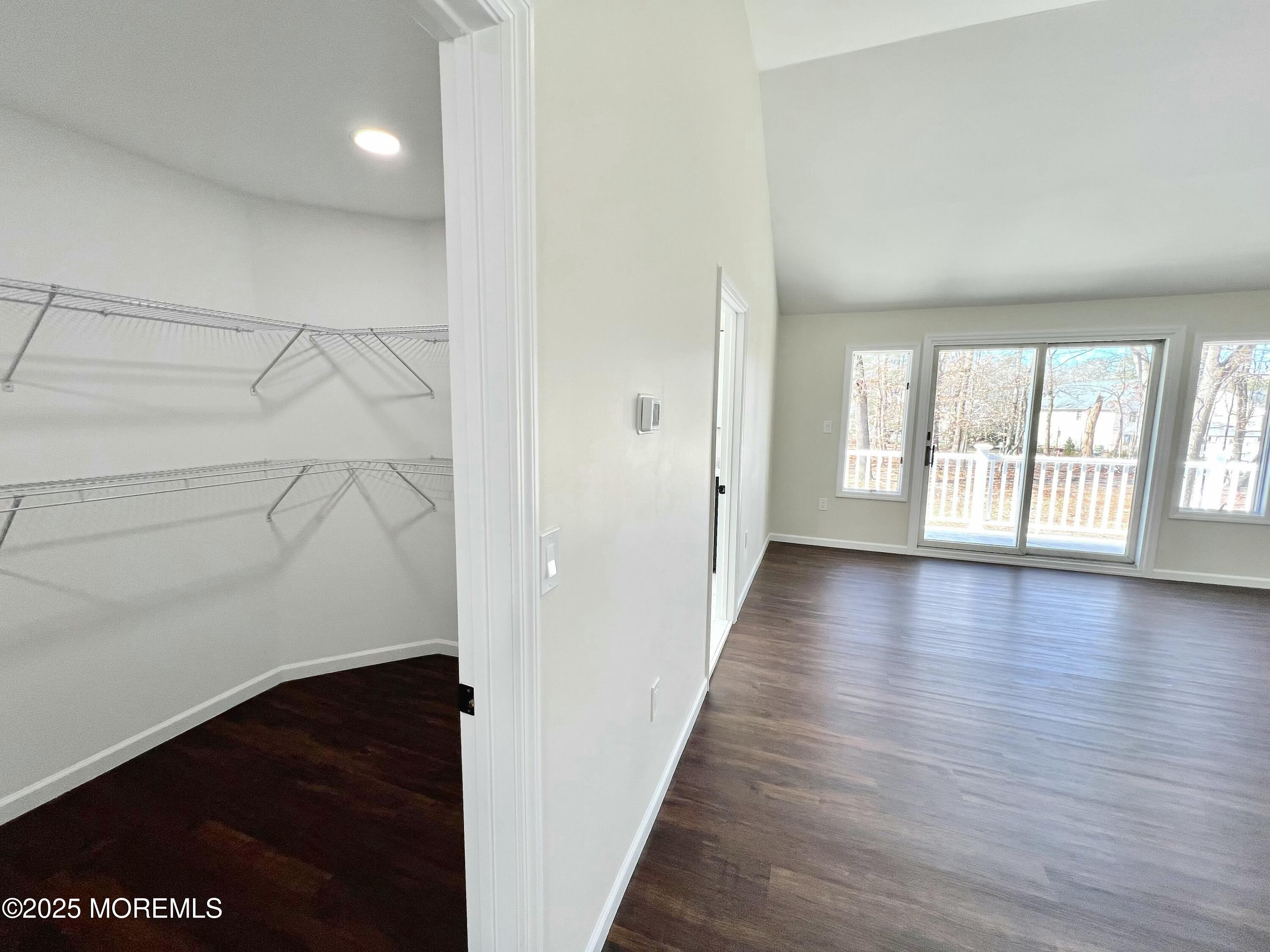155 Hamilton Road Tinton Falls, NJ 07724 - Photo 19 of 49 a view of a hallway with wooden floor and closet