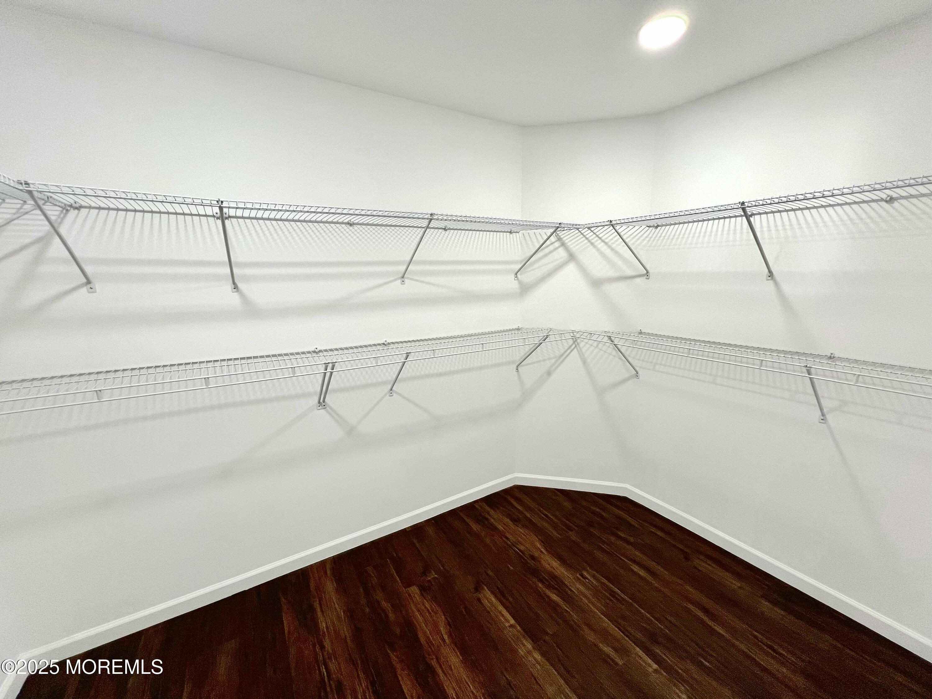 155 Hamilton Road Tinton Falls, NJ 07724 - Photo 20 of 49 a view of a room with racks on the wall