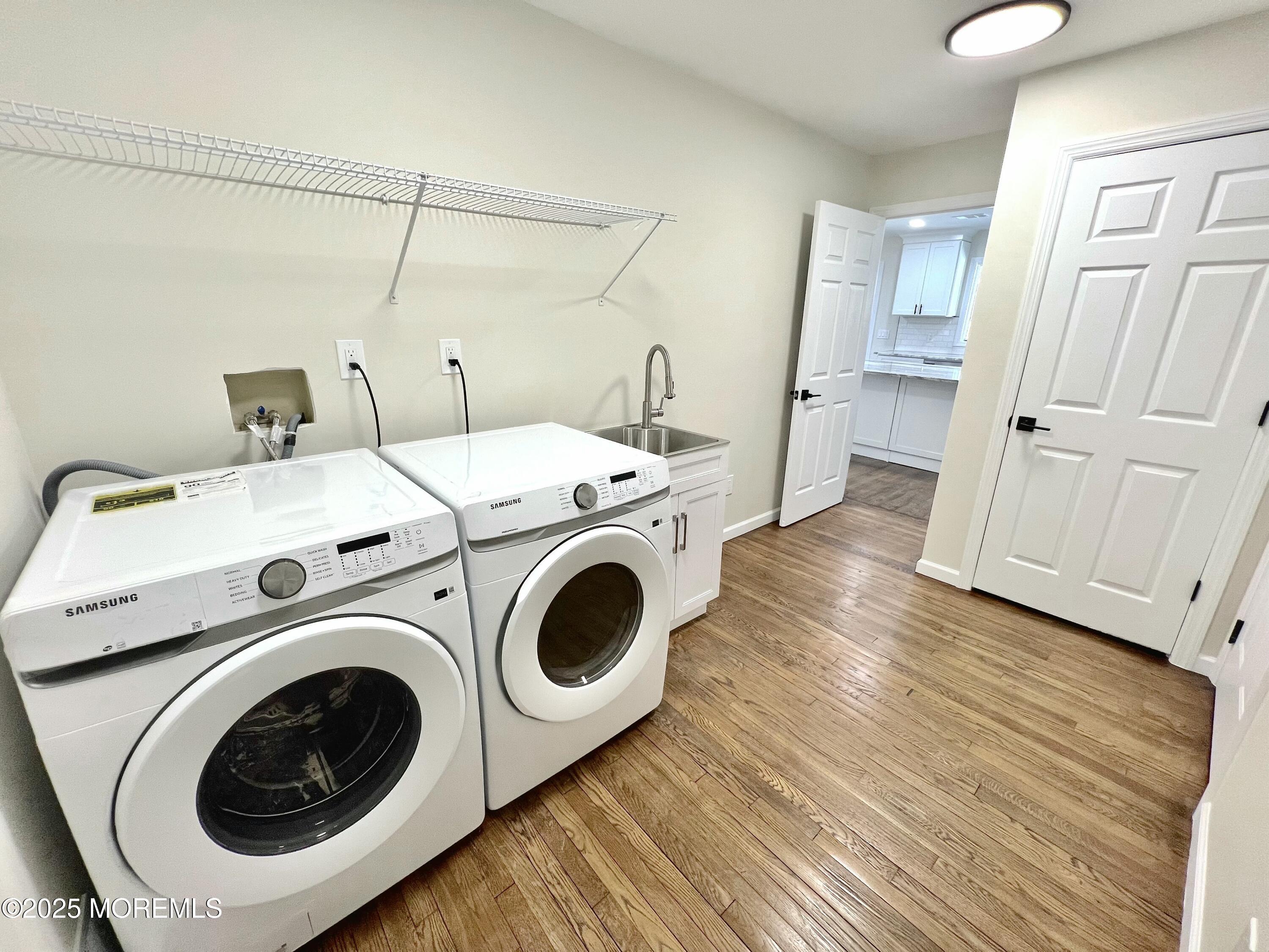 155 Hamilton Road Tinton Falls, NJ 07724 - Photo 4 of 49 a utility room with dryer and washer
