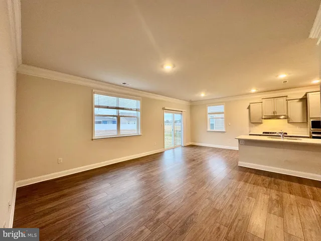 a bathroom with a sink a shower and a mirror