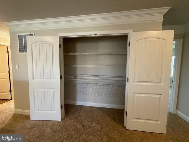 a refrigerator freezer sitting inside of a kitchen