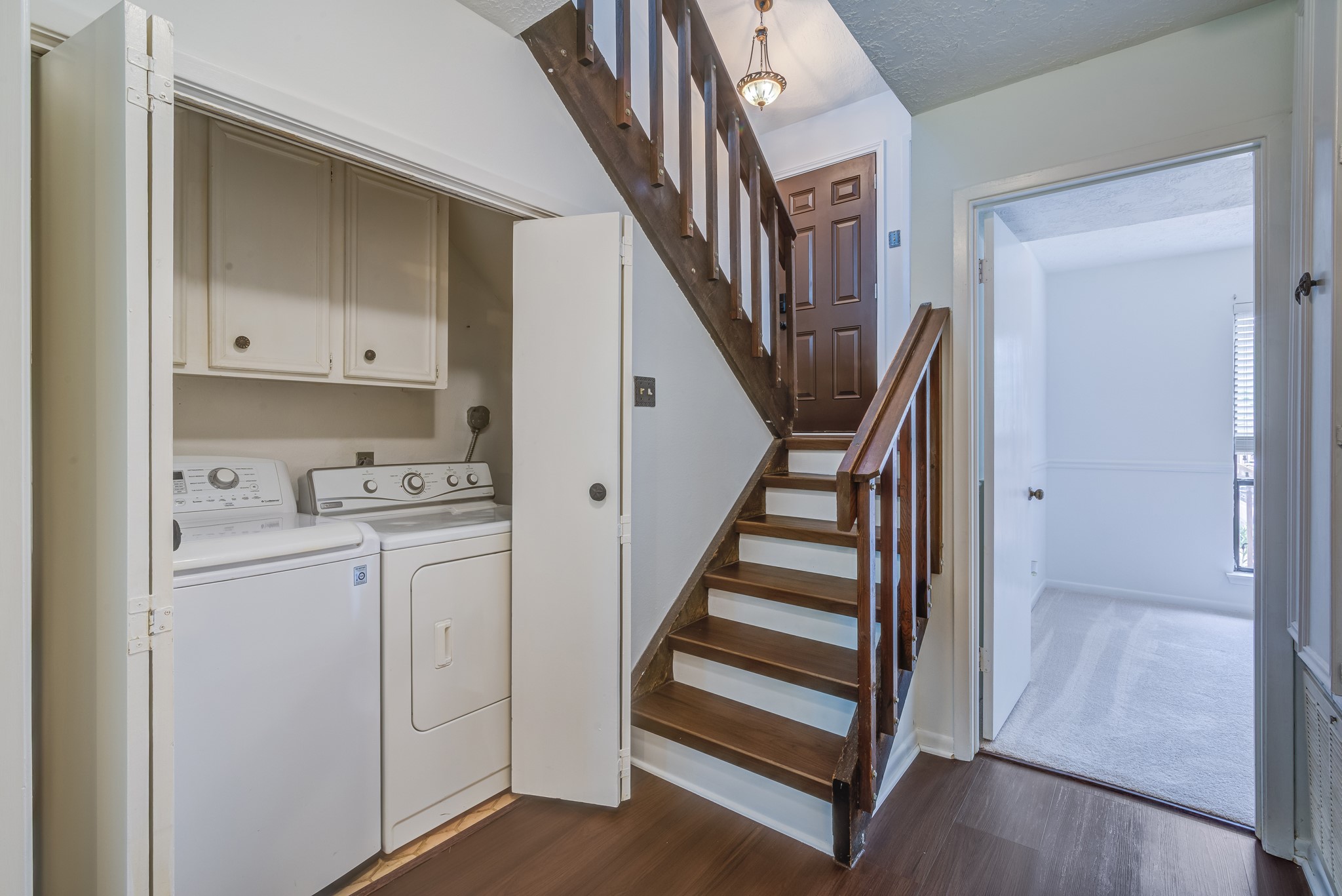 671 Davis Road League City, TX 77573 - Photo 20 of 34 a view of entryway with hallway and stairs