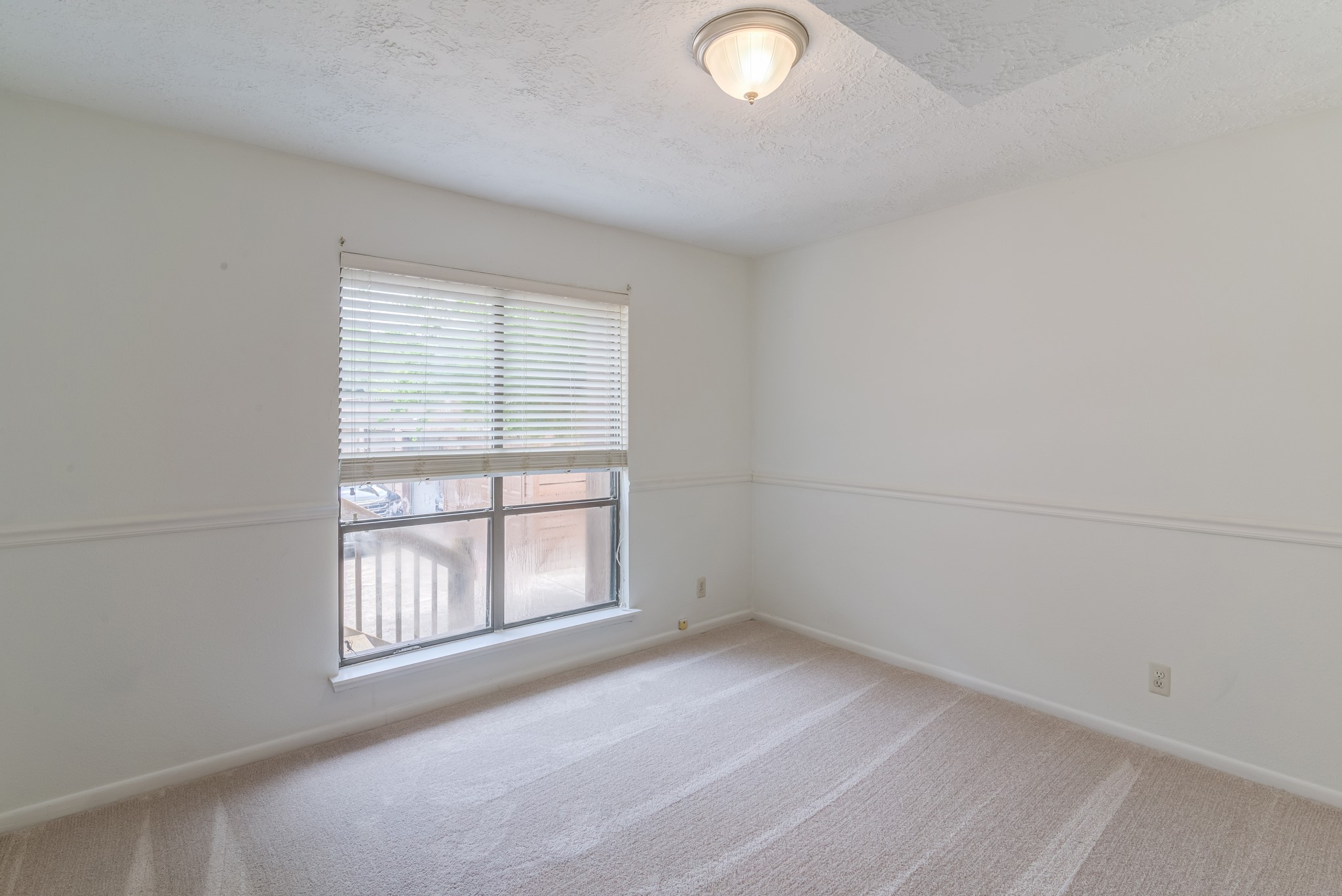 671 Davis Road League City, TX 77573 - Photo 21 of 34 an empty room with windows