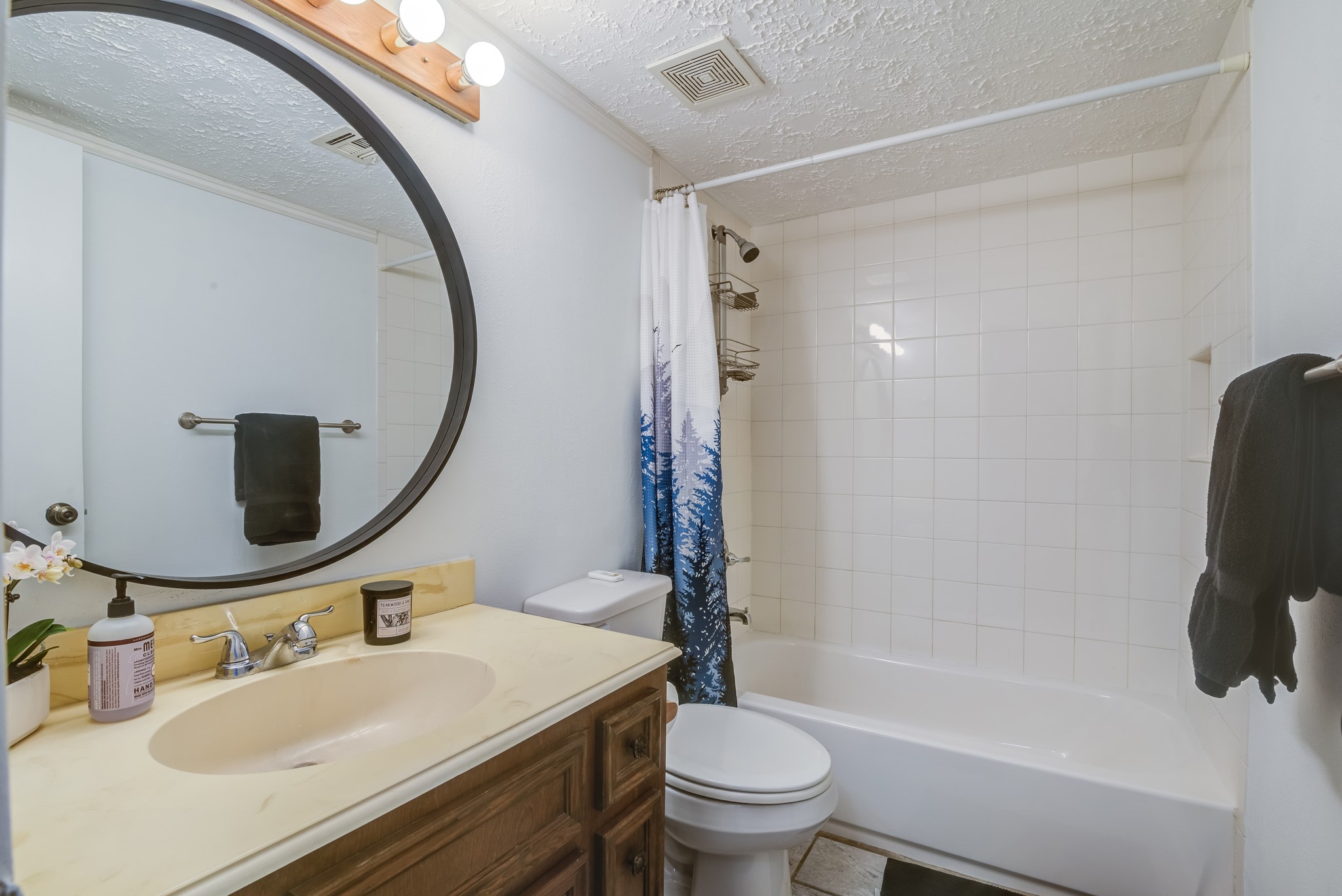 671 Davis Road League City, TX 77573 - Photo 23 of 34 a bathroom with a sink toilet and shower