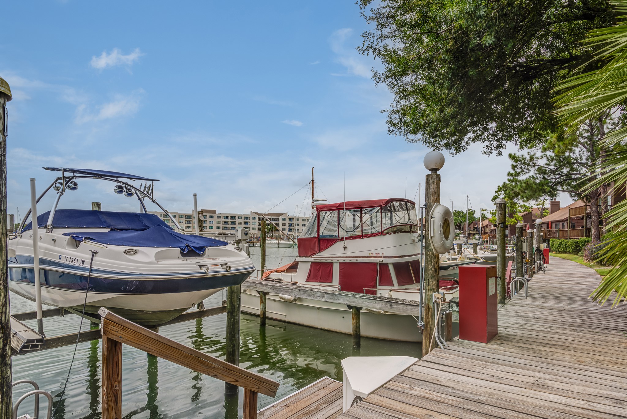 671 Davis Road League City, TX 77573 - Photo 32 of 34 a wooden deck with furniture and outdoor seating