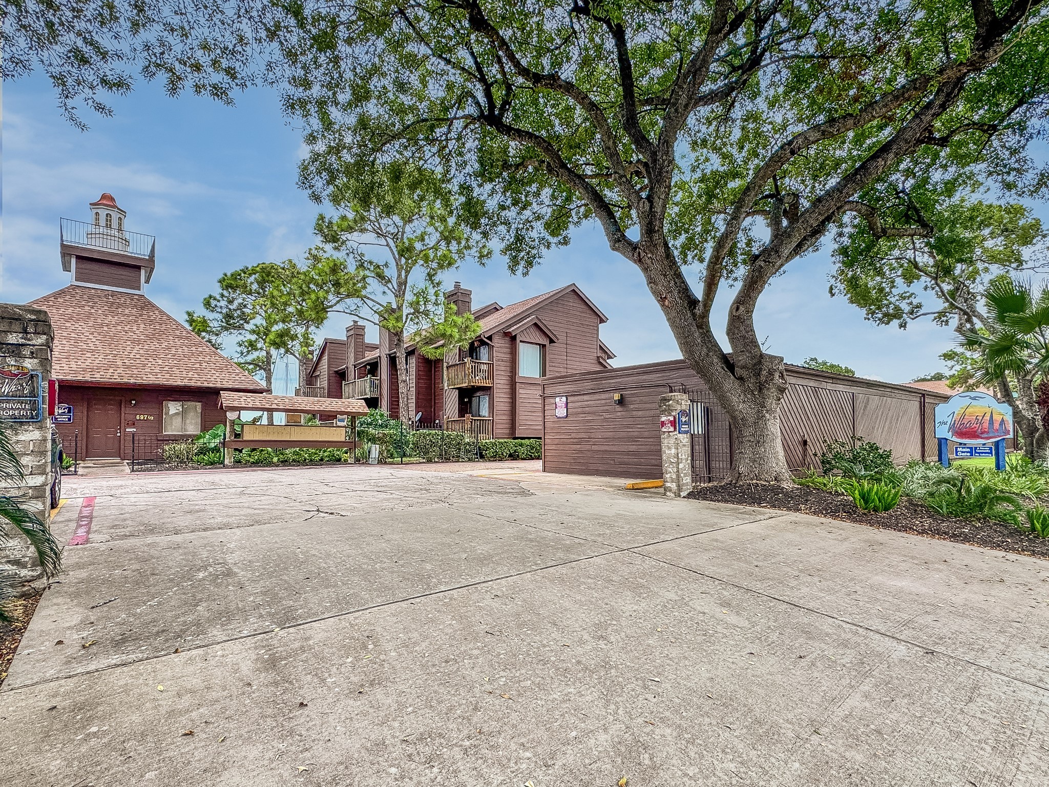 671 Davis Road League City, TX 77573 - Photo 33 of 34 a front view of a house with a yard and a garage