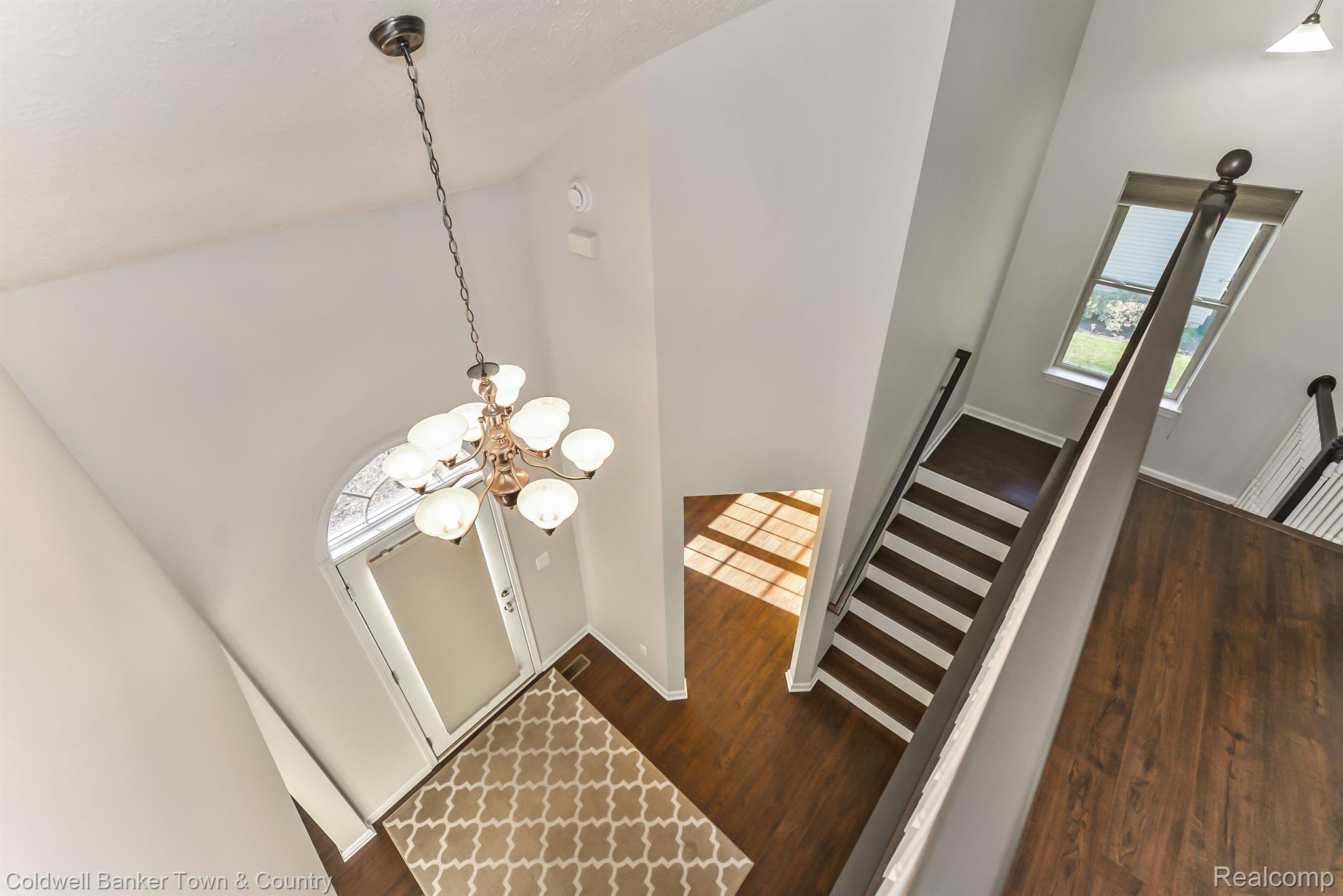 213 Slider Avenue Howell, MI 48843 - Photo 52 of 64 Two-story foyer