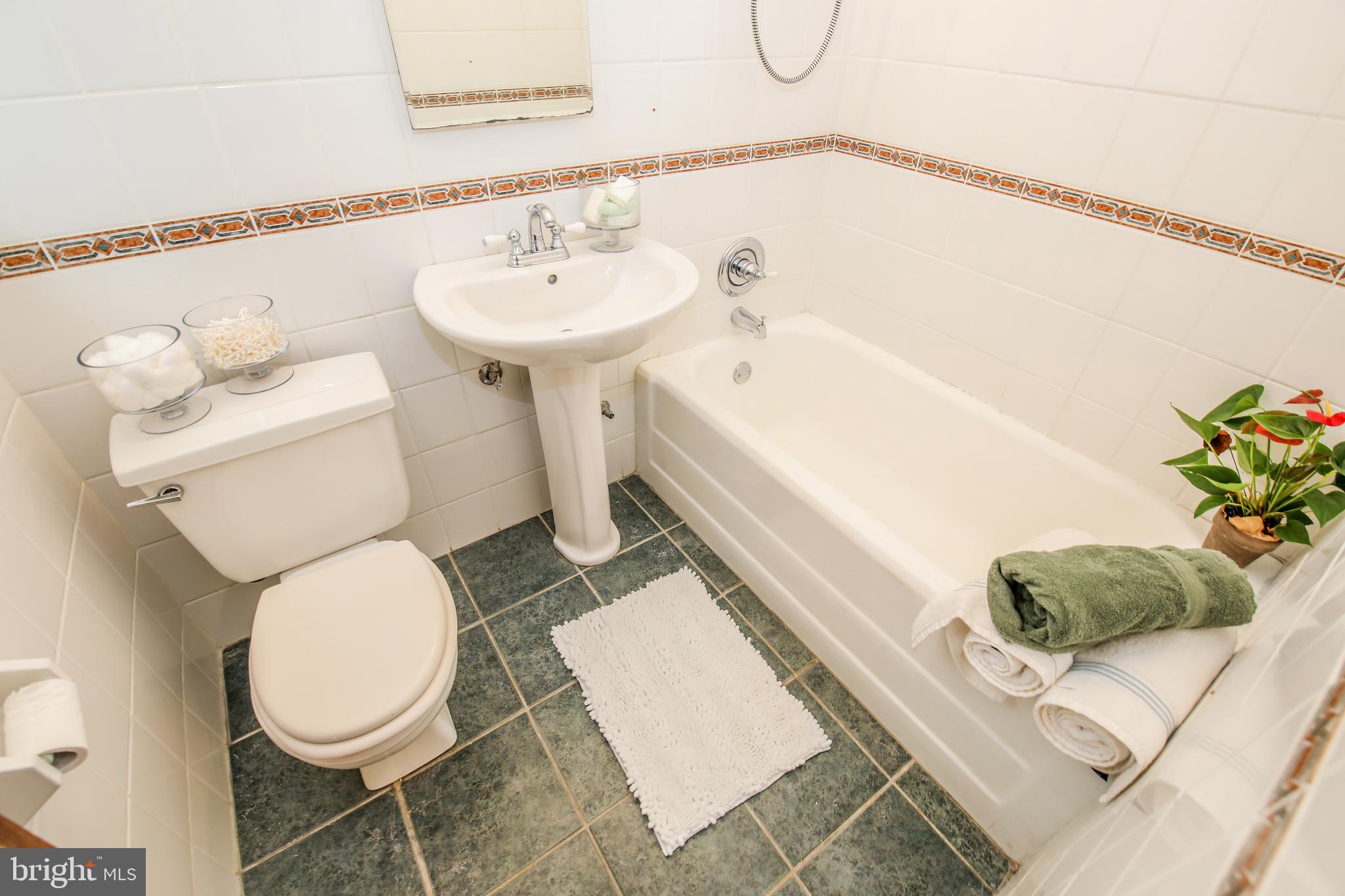 10 Hillside Road, Unit A Greenbelt, MD 20770 - Photo 18 of 44 Bathroom has ceramic tile, pedestal sink