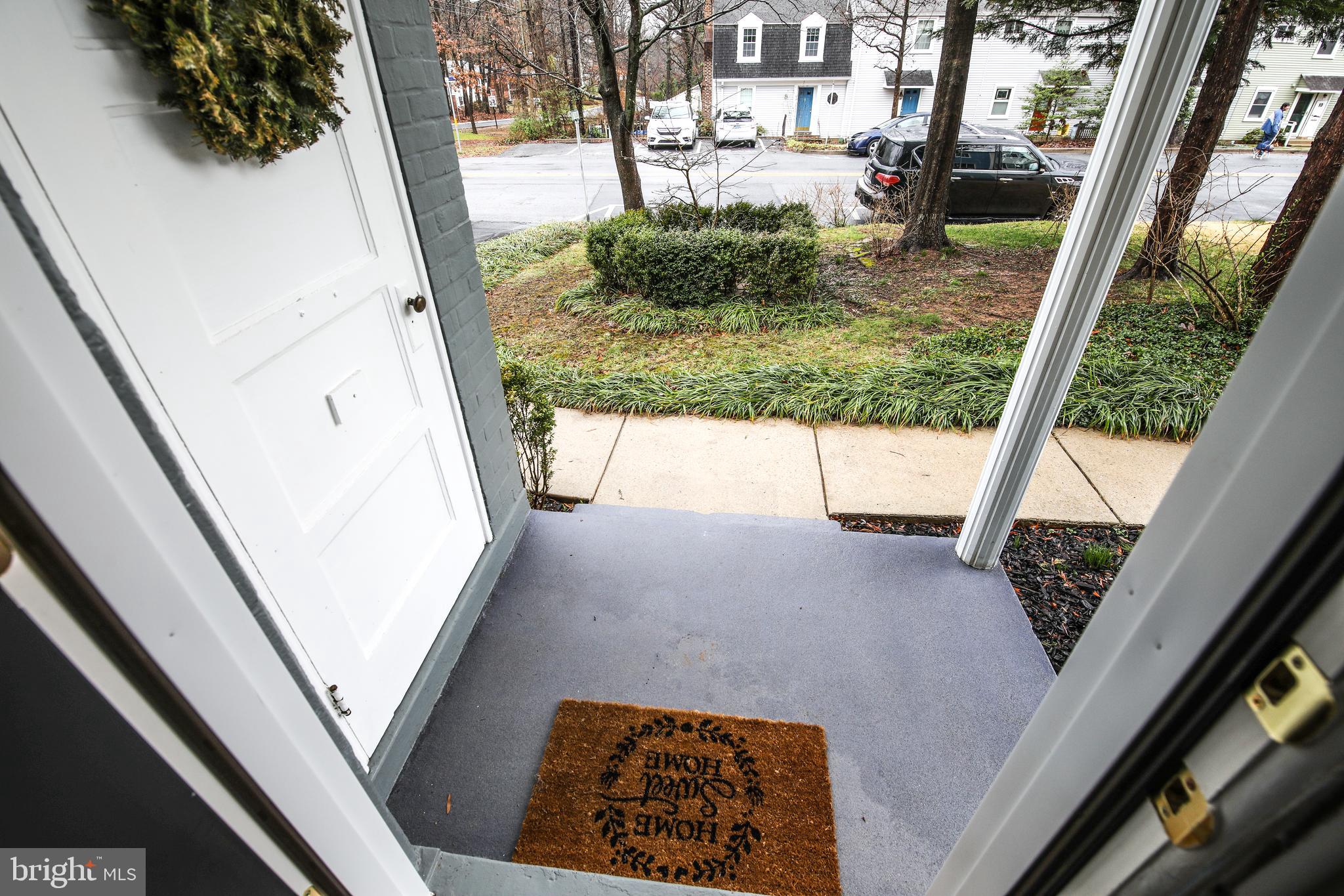 10 Hillside Road, Unit A Greenbelt, MD 20770 - Photo 33 of 44 Front porch with utility closet (door on the left)
