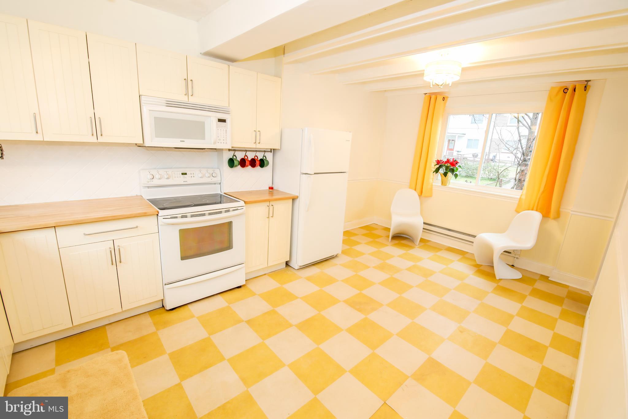 10 Hillside Road, Unit A Greenbelt, MD 20770 - Photo 6 of 44 Look at all this space to cook, eat, and visit!
