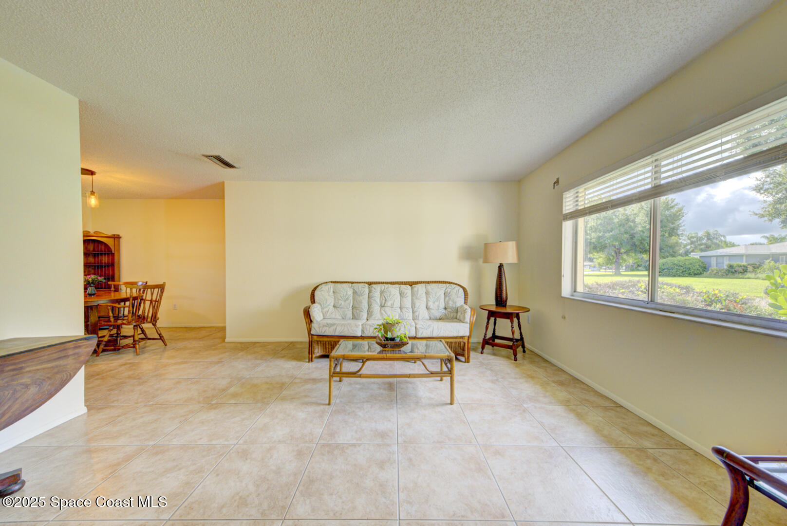 4610 Dunsford Road Titusville, FL 32796 - Photo 12 of 28 living room view from foyer
