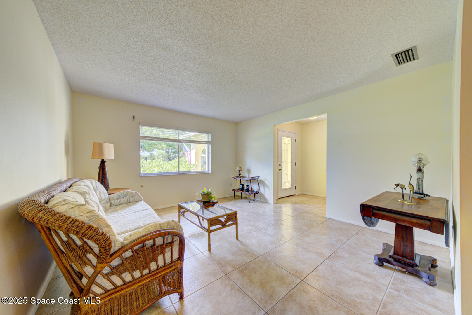4610 Dunsford Road Titusville, FL 32796 - Photo 13 of 28 living room with tile floor