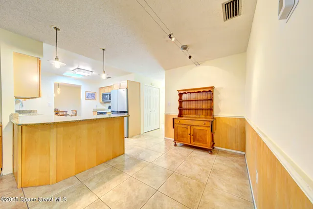 a bathroom with a sink a toilet and a bathtub