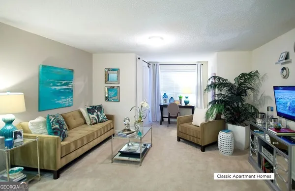 a living room with furniture and a couch