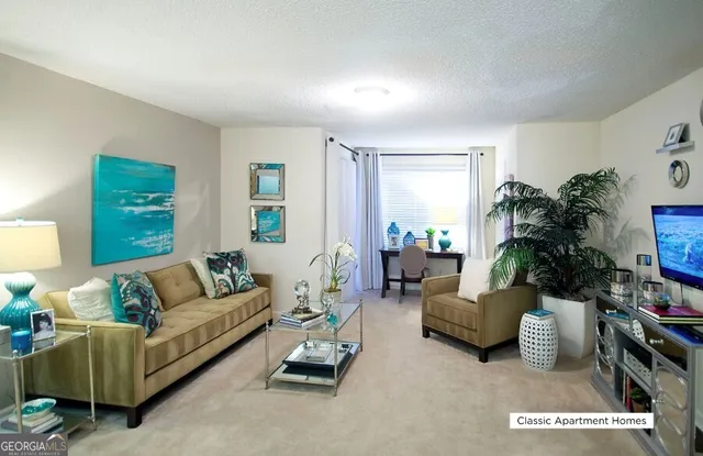 a living room with furniture and a couch