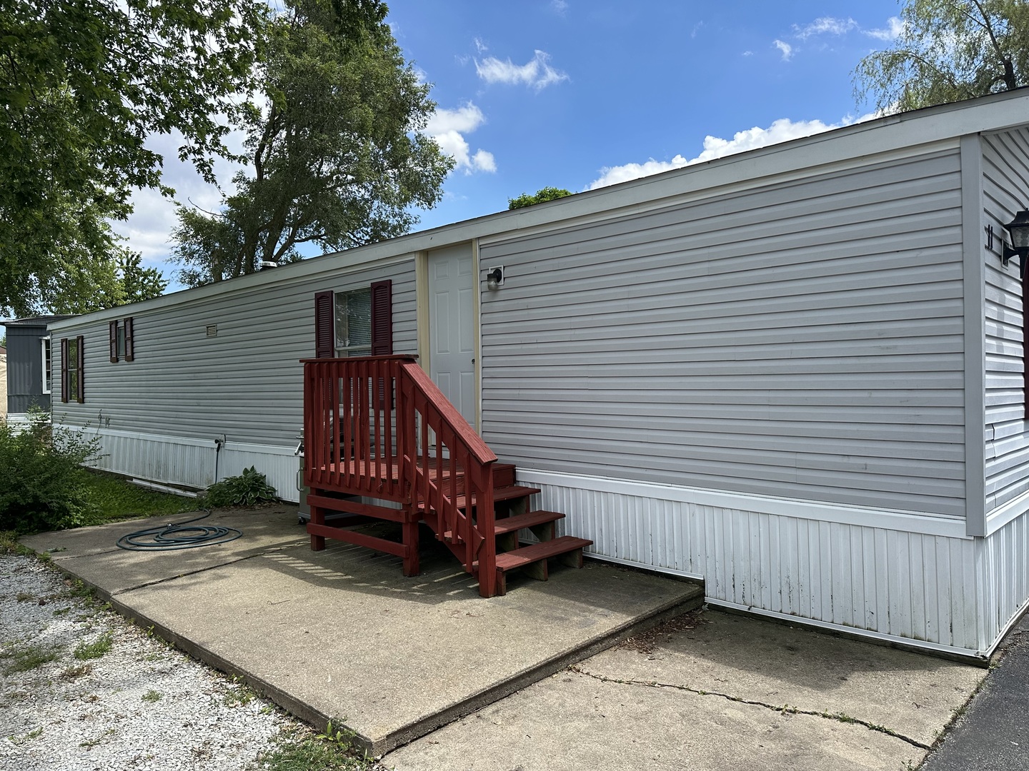 10557 North State Rte 50, Unit 11 Manteno, IL 60950 - Photo 1 of 11 a view of a house with a yard