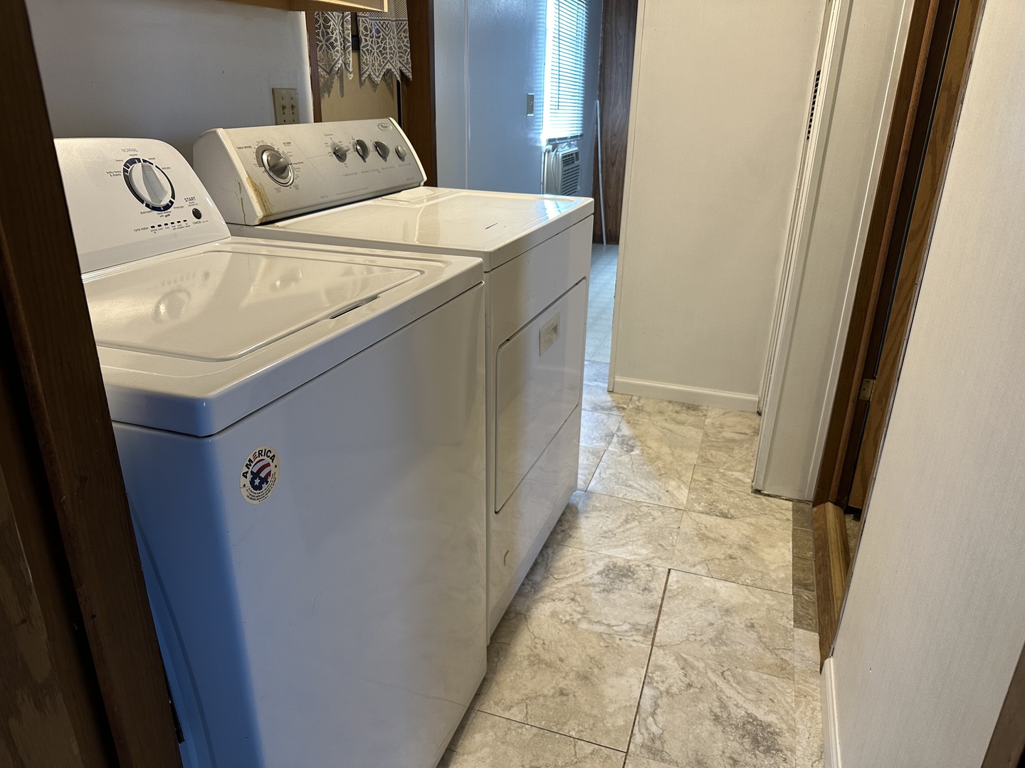 10557 North State Rte 50, Unit 11 Manteno, IL 60950 - Photo 11 of 11 a utility room with dryer and washer