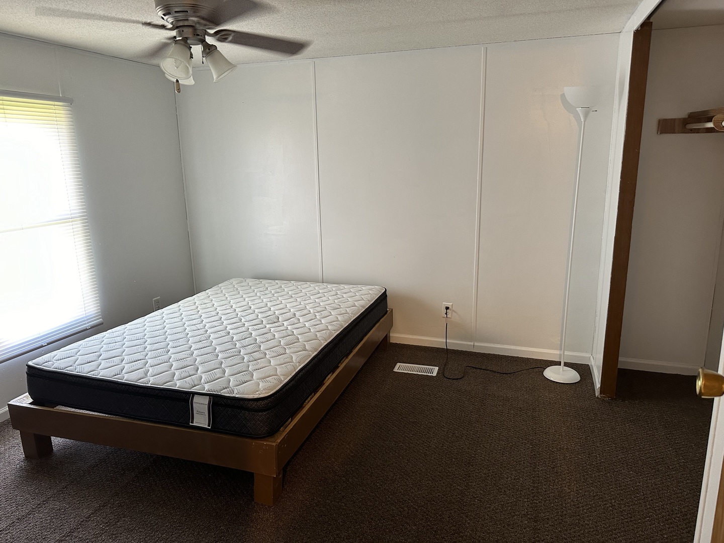 10557 North State Rte 50, Unit 11 Manteno, IL 60950 - Photo 9 of 11 a room with a table and window