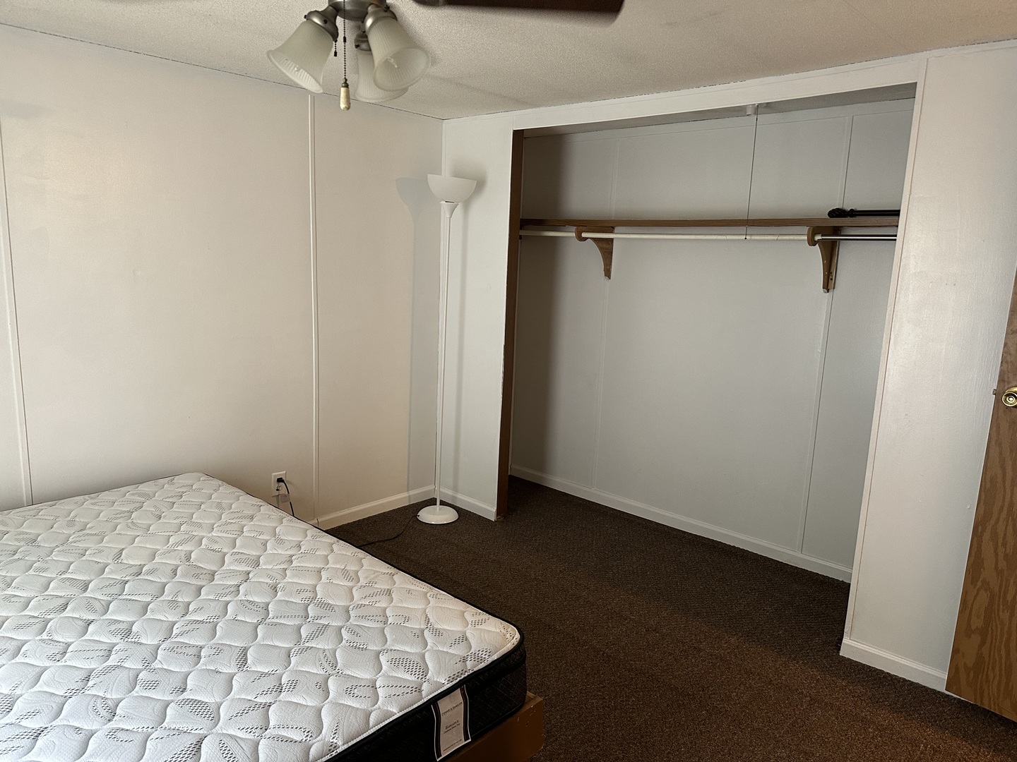 10557 North State Rte 50, Unit 11 Manteno, IL 60950 - Photo 10 of 11 a bedroom with a bed and a dresser