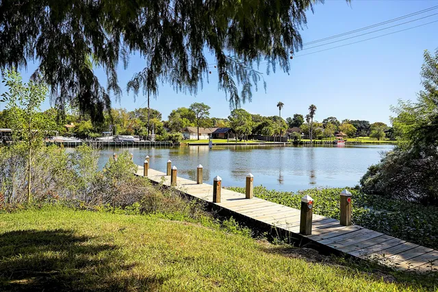a view of a lake with a big yard