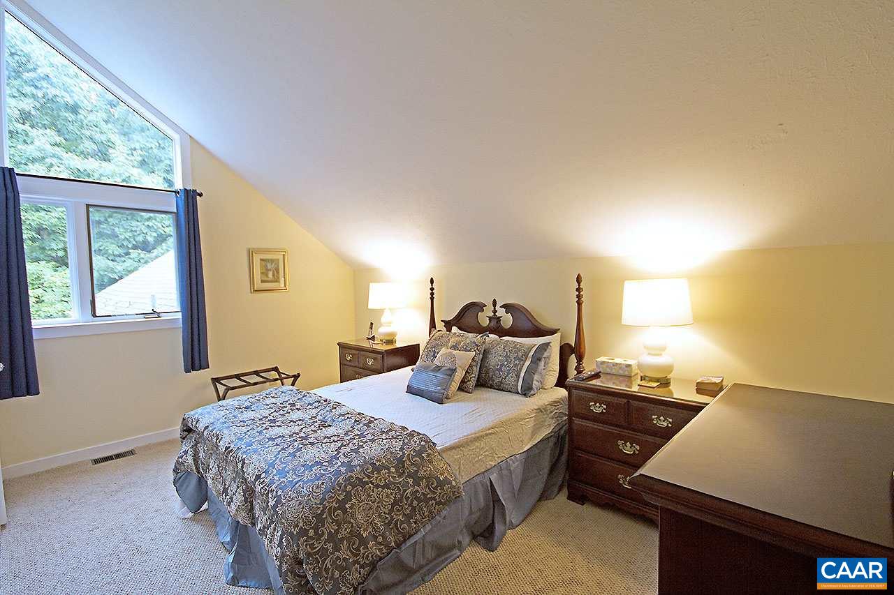 448 Three Ridges Roseland, VA 22967 - Photo 15 of 19 a bedroom with a bed and wooden floor