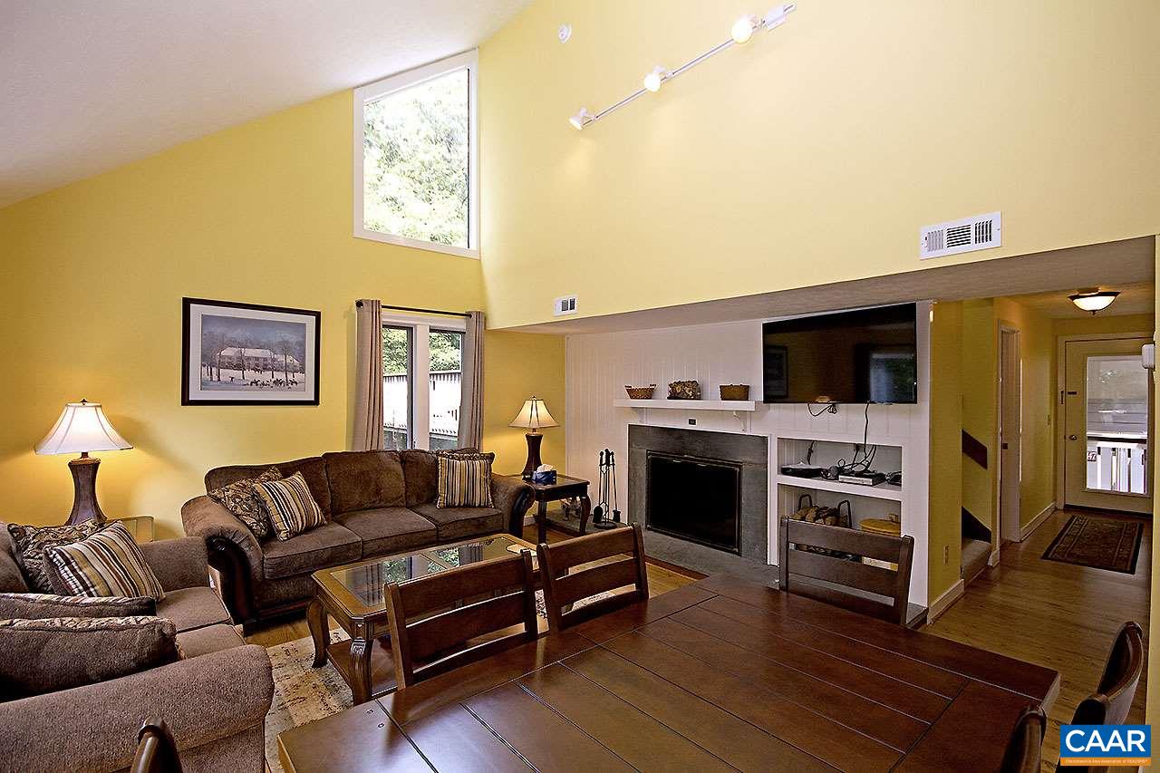 448 Three Ridges Roseland, VA 22967 - Photo 3 of 19 a living room with furniture and a flat screen tv