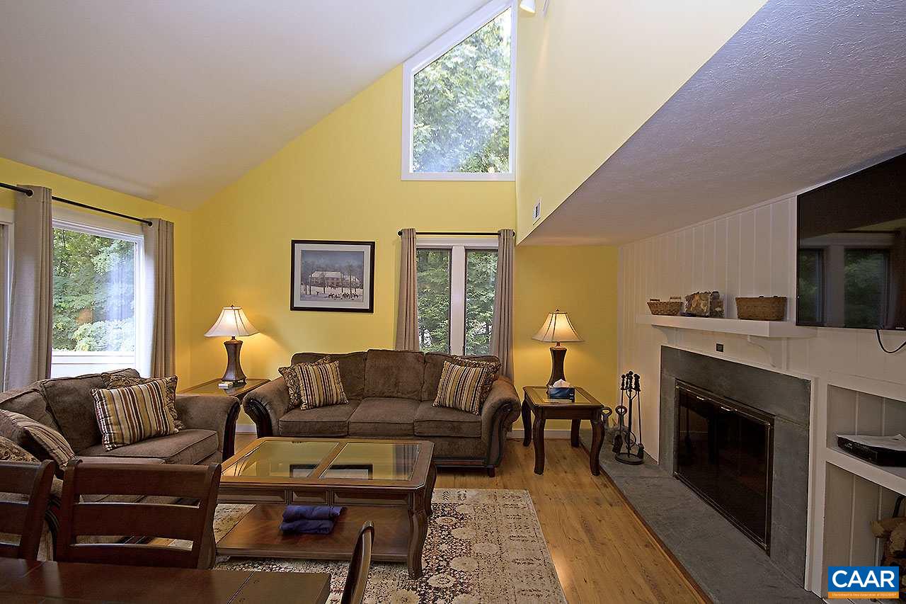 448 Three Ridges Roseland, VA 22967 - Photo 5 of 19 a living room with furniture a fireplace and a large window