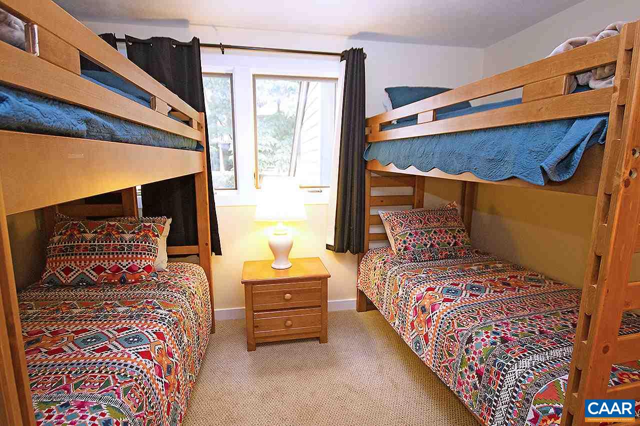 448 Three Ridges Roseland, VA 22967 - Photo 10 of 19 a bedroom with two beds and a window