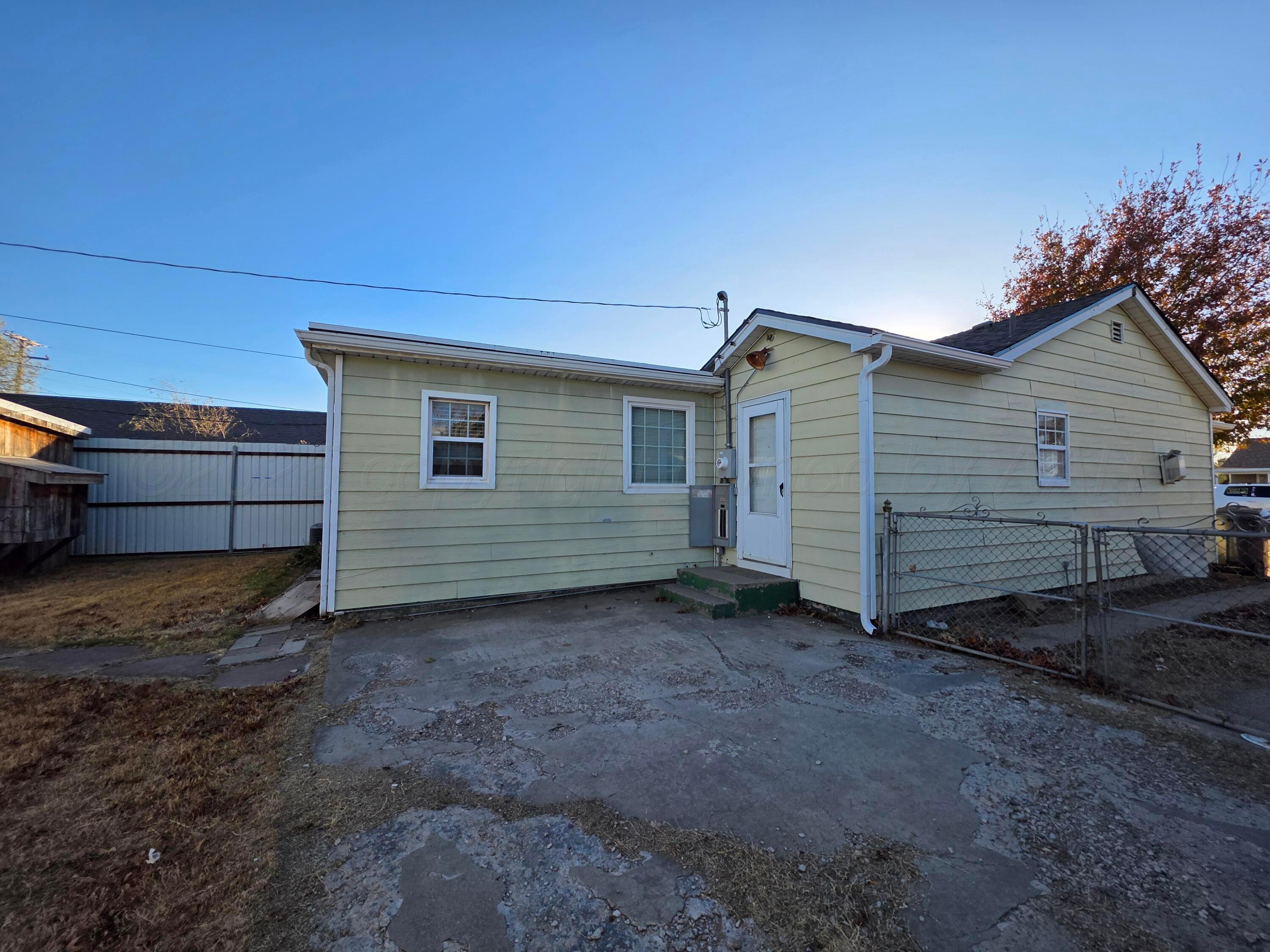 3609 South Jackson Street Amarillo, TX 79110 - Photo 25 of 30 a view of a house with a yard