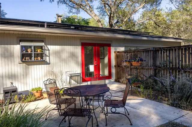 a view of a chairs and tables in patio