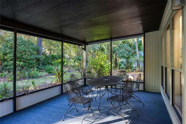 a living room with large windows