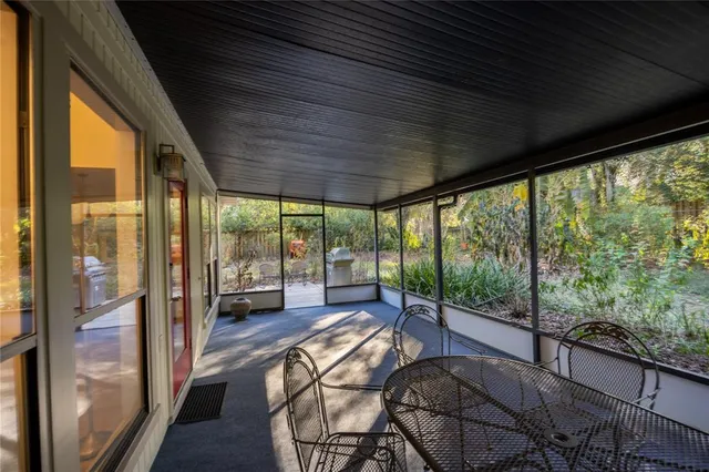 a front view of house with a garden