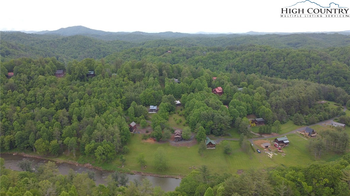 710 River Hills Road Lansing, NC 28643 - Photo 35 of 38 a view of a lush green field