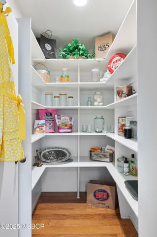 a view of a backyard with a small cabin